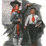 Boy scout measuring height of younger boy