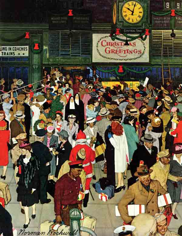Crowd of people at a train station during Christmas