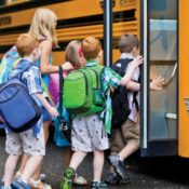 Kids boarding a school bus