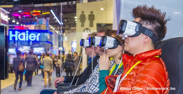 People sitting in chairs with VR headsets