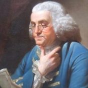 Ben Franklin reading a book