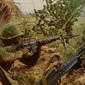 Soldiers fighting in Vietnam jungle