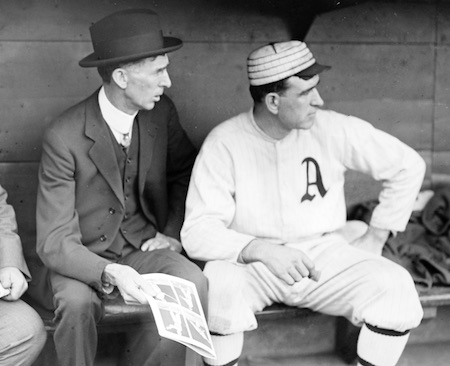 Baseball manager Connie Mack in the dugout in 1914