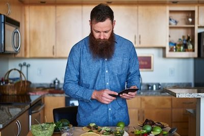 Millenial man cooking