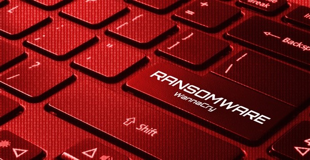 A keyboard with a key reading "Ransomware", signifying malicious hackers ability to hold a computer network hostage.