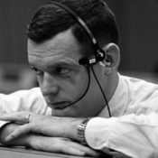 Glynn Lunney resting his arms on a desk