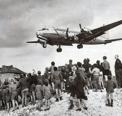 Germans watching an American plane fly over them