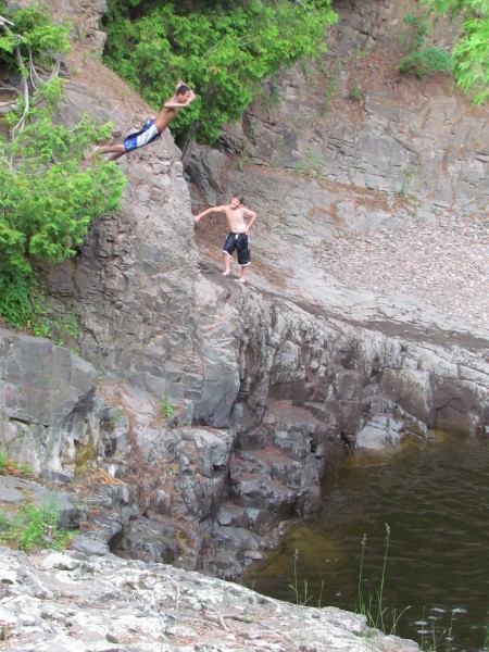 Men climbing rocks