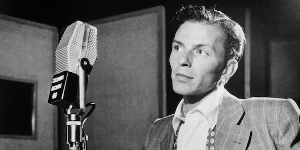 A young Frank Sinatra and a microphone