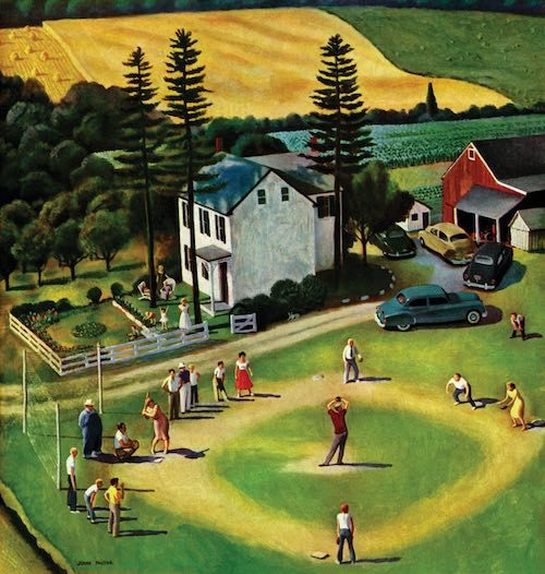 Family playing baseball in a field