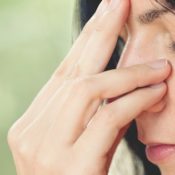 Woman taking a calming breath