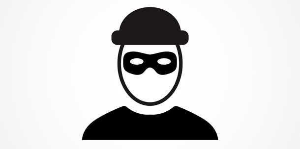 Robber wearing domino mask