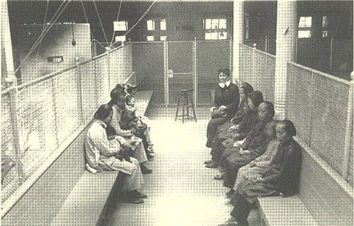 Chinese women and children in a holding cell