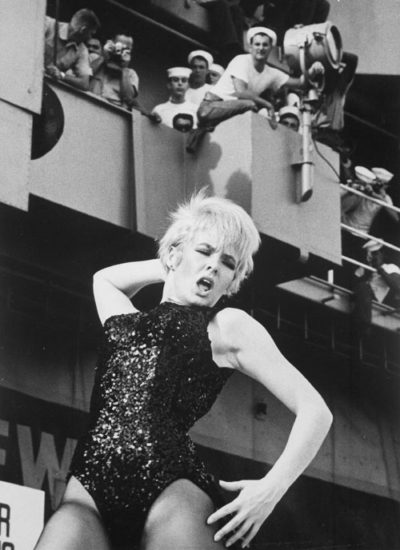 Joey Heatherton performing before American GIs aboard the U.S.S. Ticonderoga