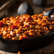 Bowl full of cooked beans.