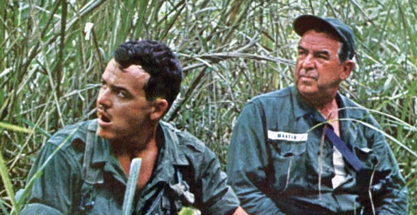 An American GI and his father in a Vietnam jungle