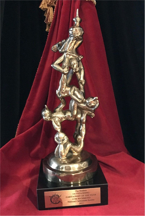 A trophy on a scarlet ribbon.