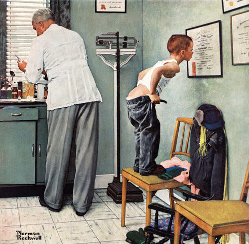 In a physician's office, a boy prepares to recieve a shot while inspecting the doctor's credentials on the wall.