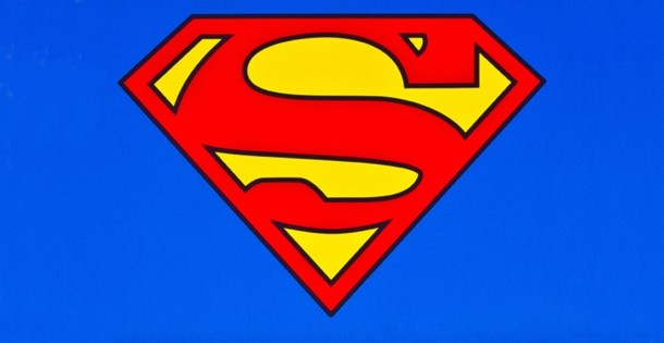 The Superman logo on a blue field.