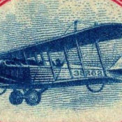 Illustration of a biplane carrying mail on a U.S. postage stamp.