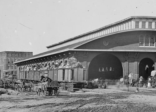 A train full of refugees in front of an Atlanta, Georgia station during the American Civil War.