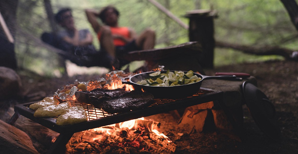 Food cooking on a campfire.