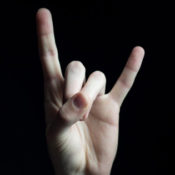 Hand in the "devil-horns" sign