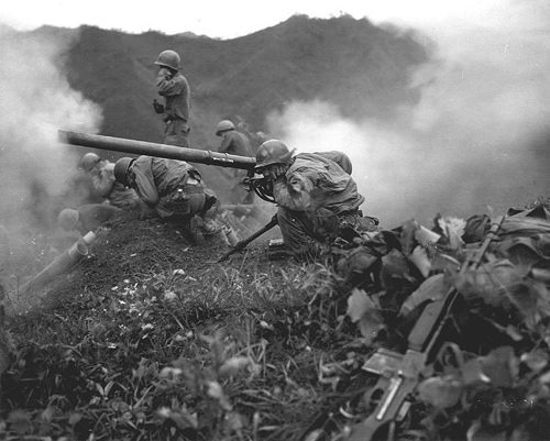 Soldier firing a big gun