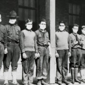 U.S. soldiers wearing surgical masks.