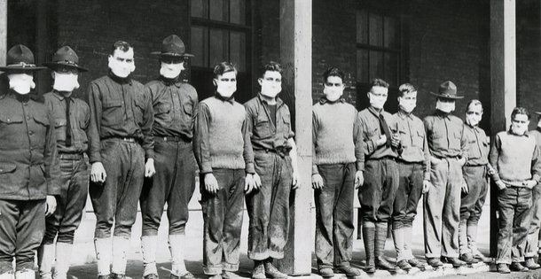 U.S. soldiers wearing surgical masks.