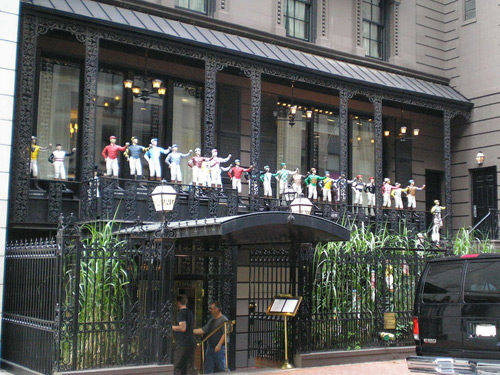 Facade of 21 club; jockey statues stand on the balcony