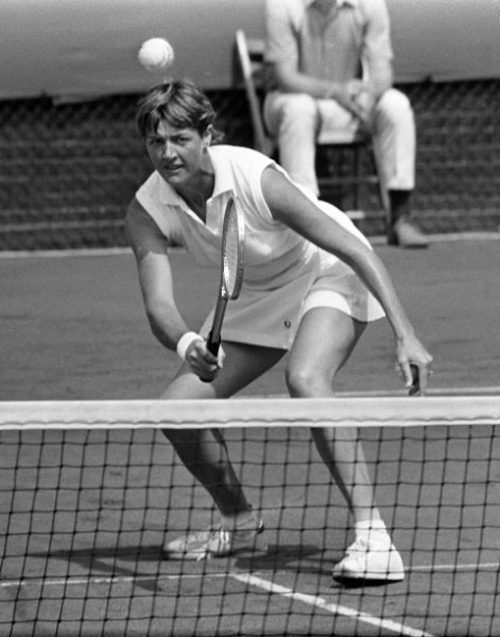 Margaret Court playing tennis.
