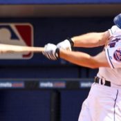 Baseball player for the Mets swinging a bat