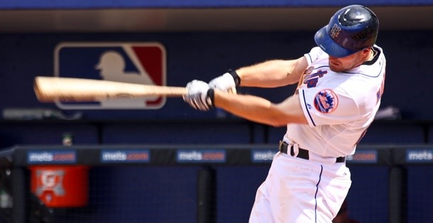 Baseball player for the Mets swinging a bat