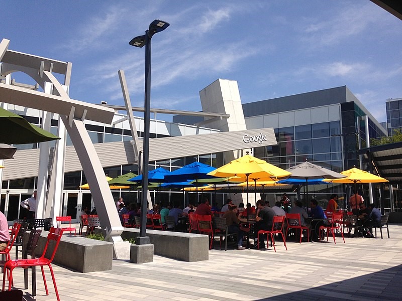 Patio furniture on a wooden platform.