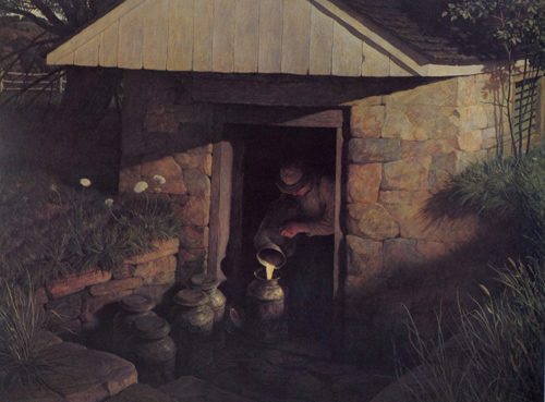 Farmer pouring milk into a tin container while standing in the barn's doorway.