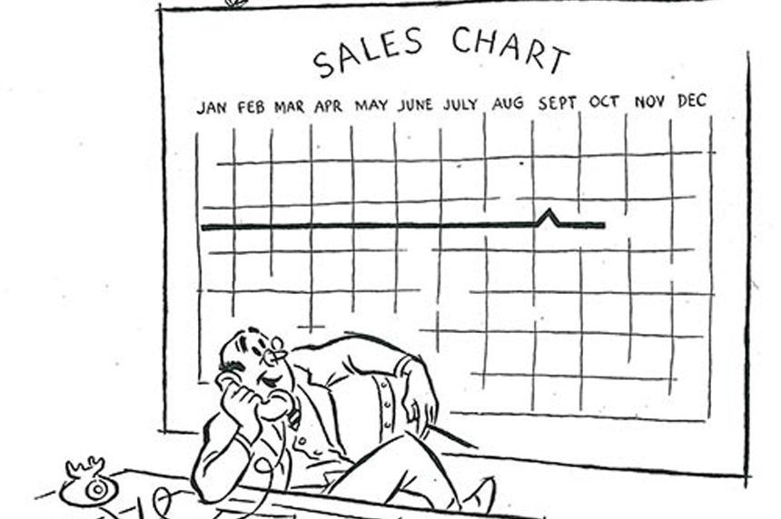 Man looking at sales chart