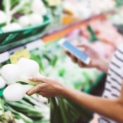 Woman shopping vegetables in a super market