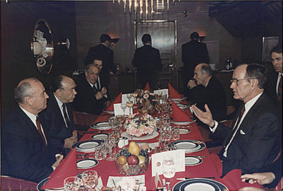 Soviet premier Mikhail Gorbachav and George H.W. Bush meet with their respective delegations in Malta