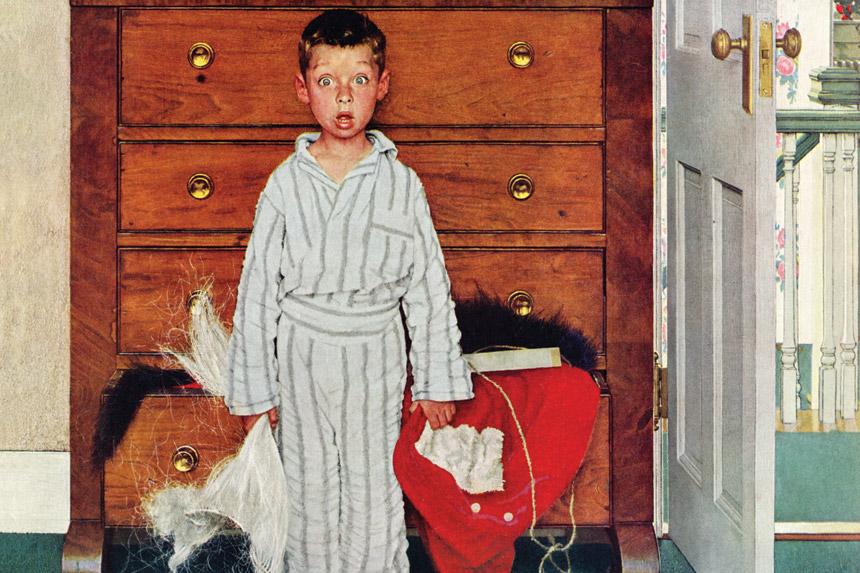 A shocked little boy finding his parent's Santa Claus outfit in their dresser.