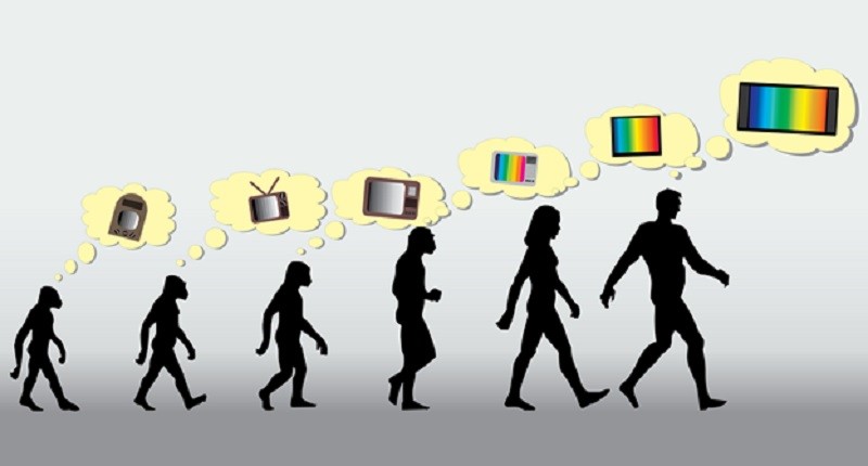 A chart showing the different stages of man as he evolves from a simple ape to a modern, upright human. Each shilouette has a thought bubble of the television in various stages of development, signifying the evolution of the medium.