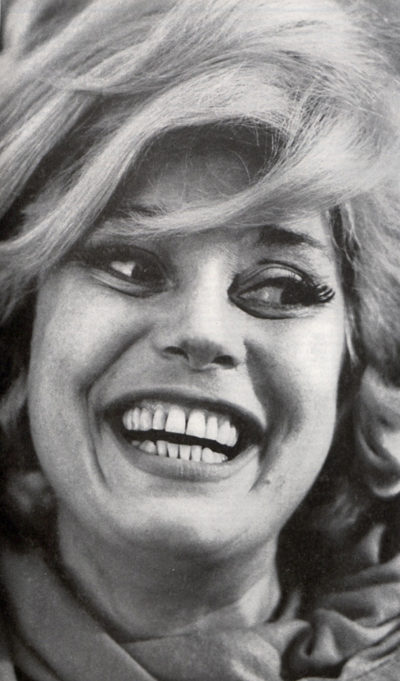 A young Carol Channing smiling in 1964