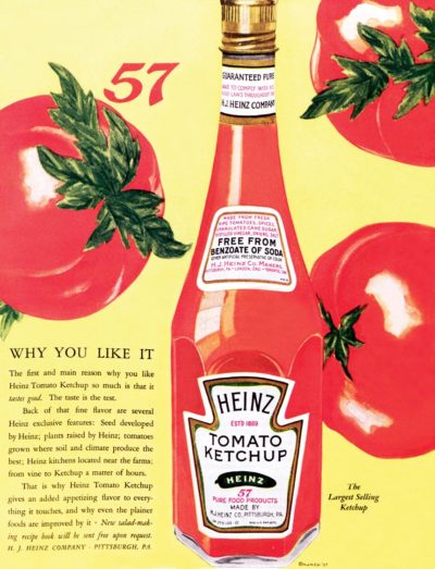 A vintage ad for Heinz Ketchup, featuring a bottle of the condiment with three tomatoes.