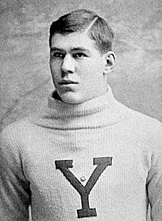 Photo portrait of Yale football player Pudge Heffelfinger in his letter sweater