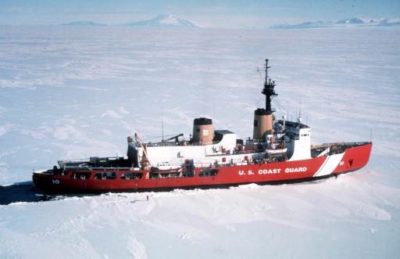 A United States Coast Guard icebreaker ship in frozen waters