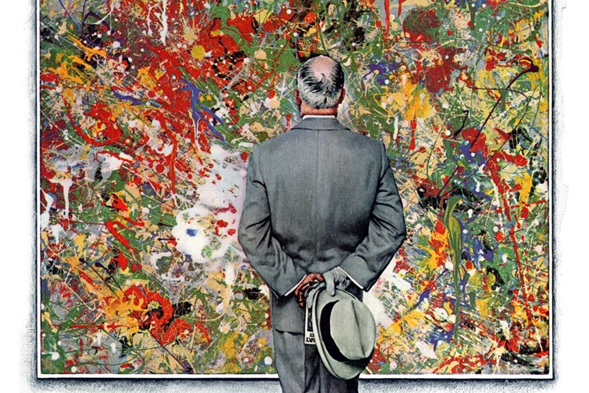 Man looking at a Jackson Pollack painting