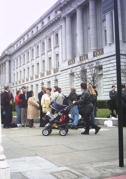 Line of people waiting to apply for marriage licenses