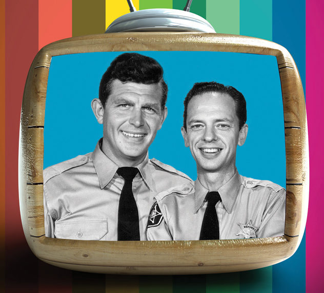 Andy Griffith as Sheriff Andy Taylor and Don Knotts as his deputy, Barney Fifte, smile on a retro television