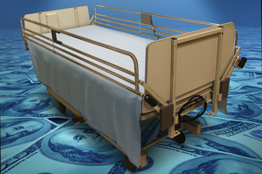 A hospital bed on a carpet of $100 dollar bills.