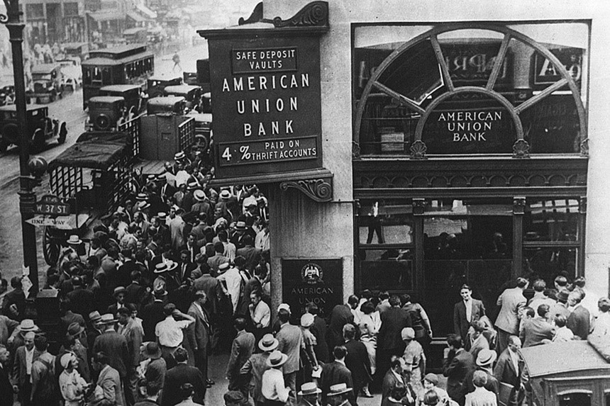 People line up outside a bank during the Great Depression